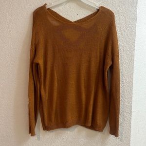 Sweater with V-neckline at the back
